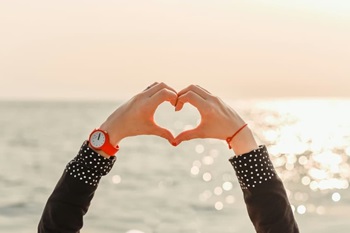 Hands creating a heart shape